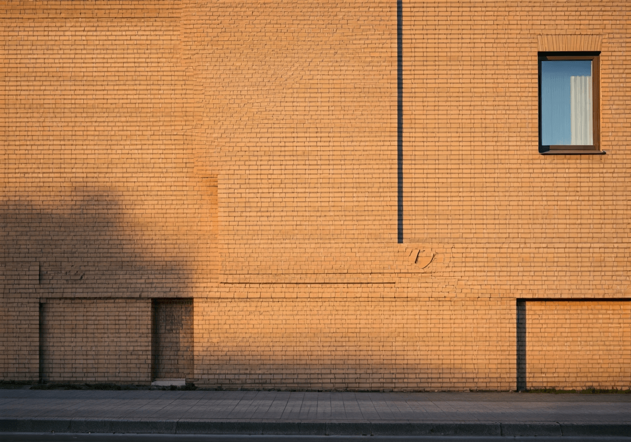 A modern, minimalist signage of a Czech post office branch in a suburban neighborhood, clean brick architecture, soft natural morning sunlight, 85mm lens, high-end editorial photography, no text, no words, no letters