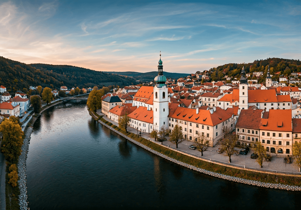 Aerial view of Benatky nad Jizerou featuring the scenic river valley and historical architecture, editorial photography, soft natural light, 85mm lens, high resolution, no text, no letters