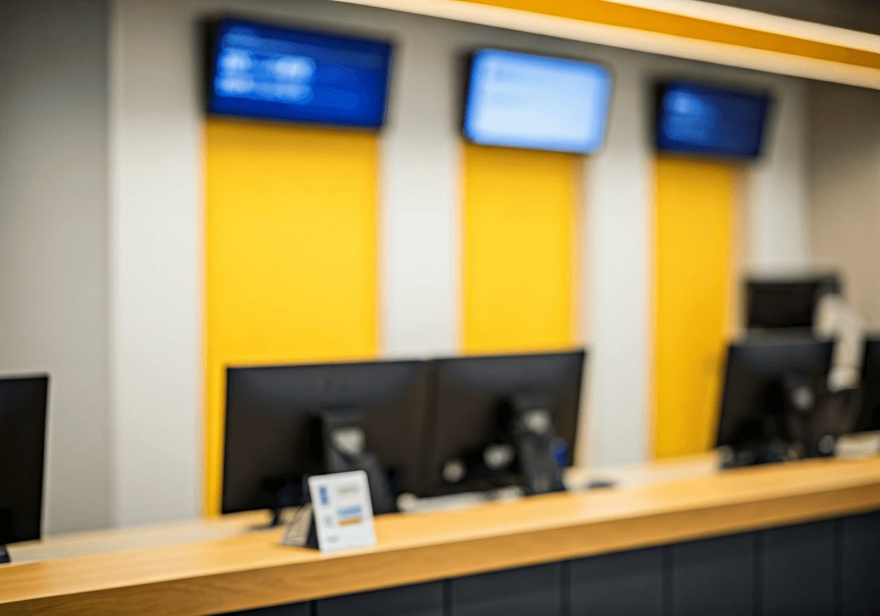 Pošta Roztoky: Jak se vyhnout frontám (Rychlý návod) 2 A professional interior of a modern Czech post office counter service, focus on digital signage and clean administrative environment, editorial photography, soft natural light, 85mm lens, highly detailed, no text, no letters