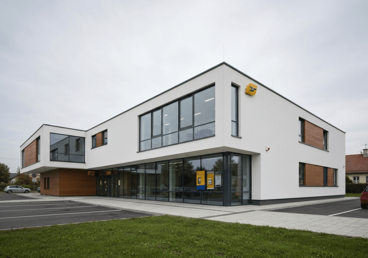 Exterior view of a modern Czech post office building in Kynšperk nad Ohří, clean architecture, daylight, editorial photography, 85mm lens, high resolution, no text, no words