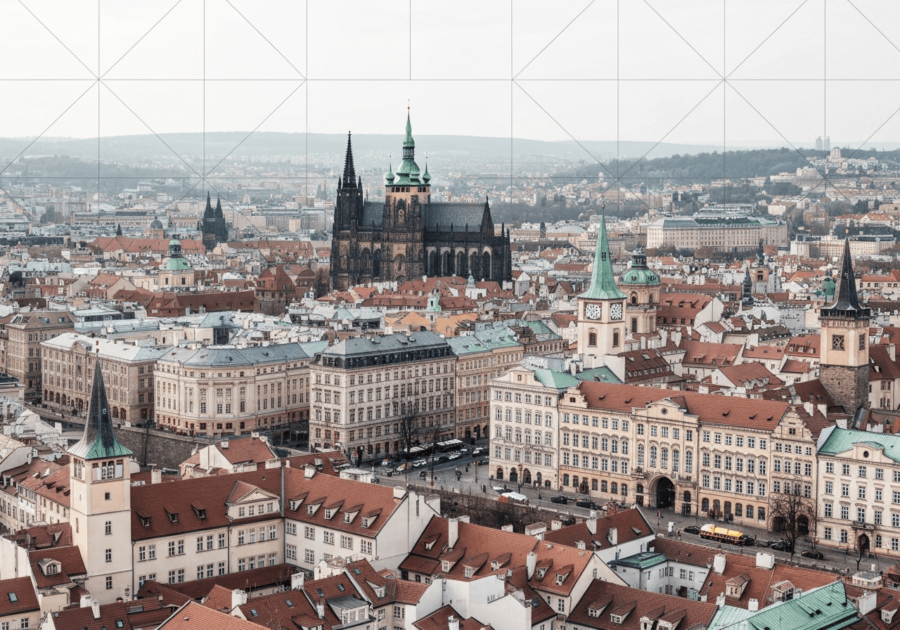 Aerial view of Prague city districts with overlay of subtle geometric grid lines, professional editorial style, soft natural light, 85mm lens, high resolution, minimalist aesthetic, no text, no words, no letters.